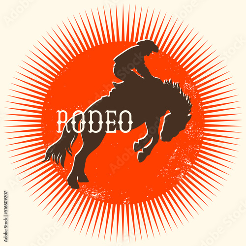 Cowboy Rodeo wild horse vector round symbol. Silhouette of Cowboy riding a wild horse on yellow sun in symbol flat style illustration with text rodeo isolated