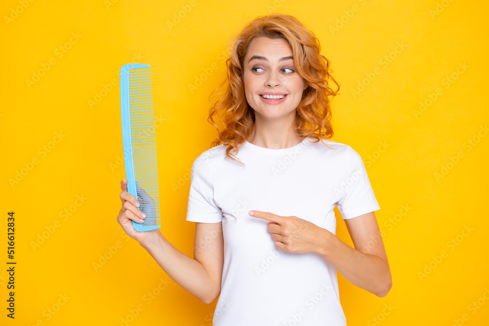 Beauty hair care. Beautiful woman combing hair. Beauty hair care. Beautiful woman combing hair.