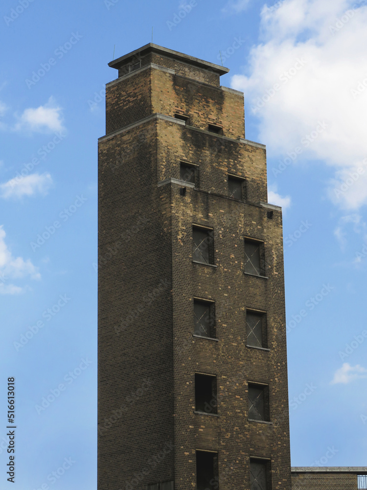 Art Deco dilapidated industrial tower in London. United Kingdom.