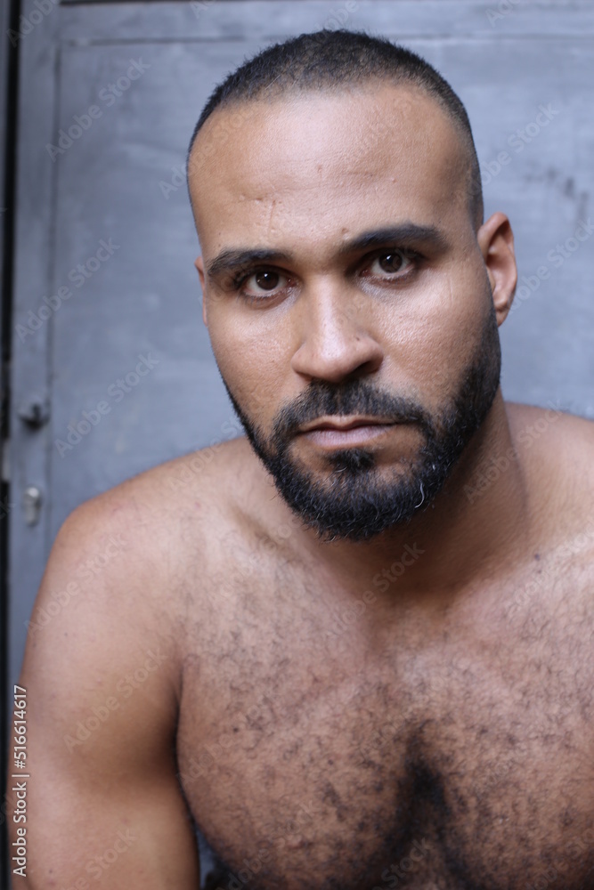 Handsome bearded man muscular build Handsome bearded man muscular build