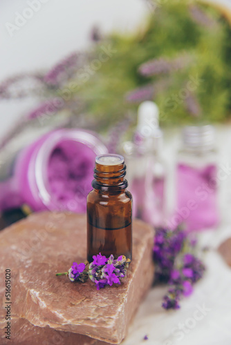 Fototapeta Naklejka Na Ścianę i Meble -  Essential oil with lavender extract. Selective focus.