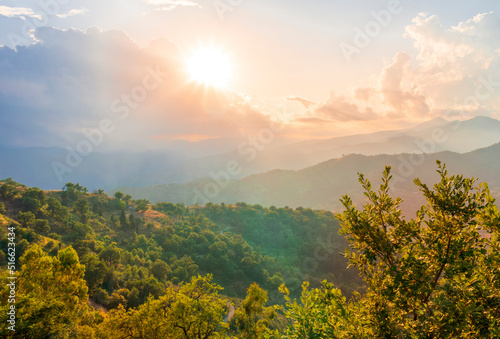 Mountain valley during sunset or sunrise. Natural spring or summer season landscape © Yaroslav