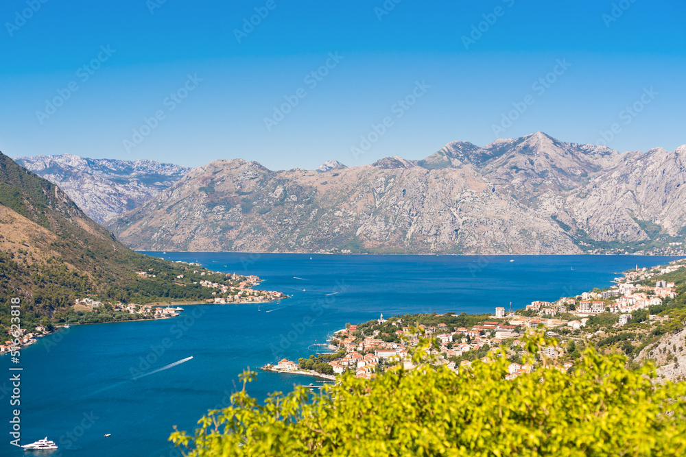 Beautiful landscape with mountain and blue sea view on a summer sunny day. Boka Kotorska bay. Montenegro. Post card. Copy space. Selective focus.