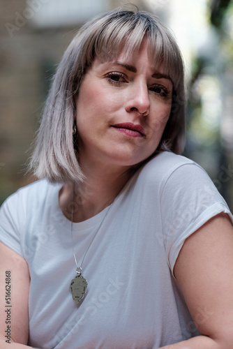 Portrait of mature english woman looking at camera.