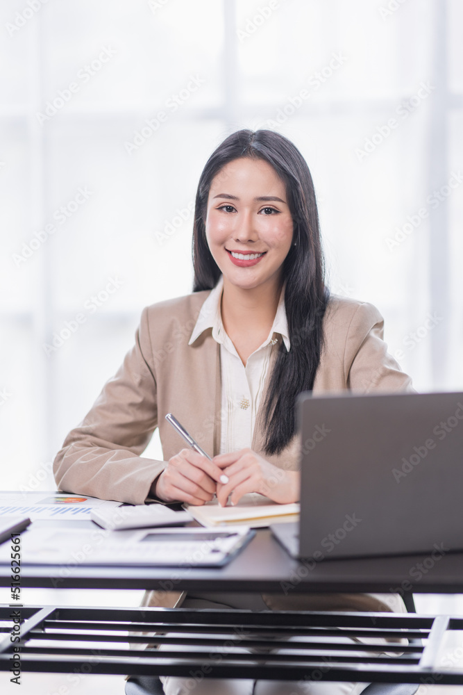 Portrait of Young woman using laptop computer at the office, Student girl working at home. Work or study from home, Asian woman freelance, business, lifestyle concept
Portrait of Young woman using laptop computer at the office, Student girl working at home. Work or study from home, Asian woman freelance, business, lifestyle concept