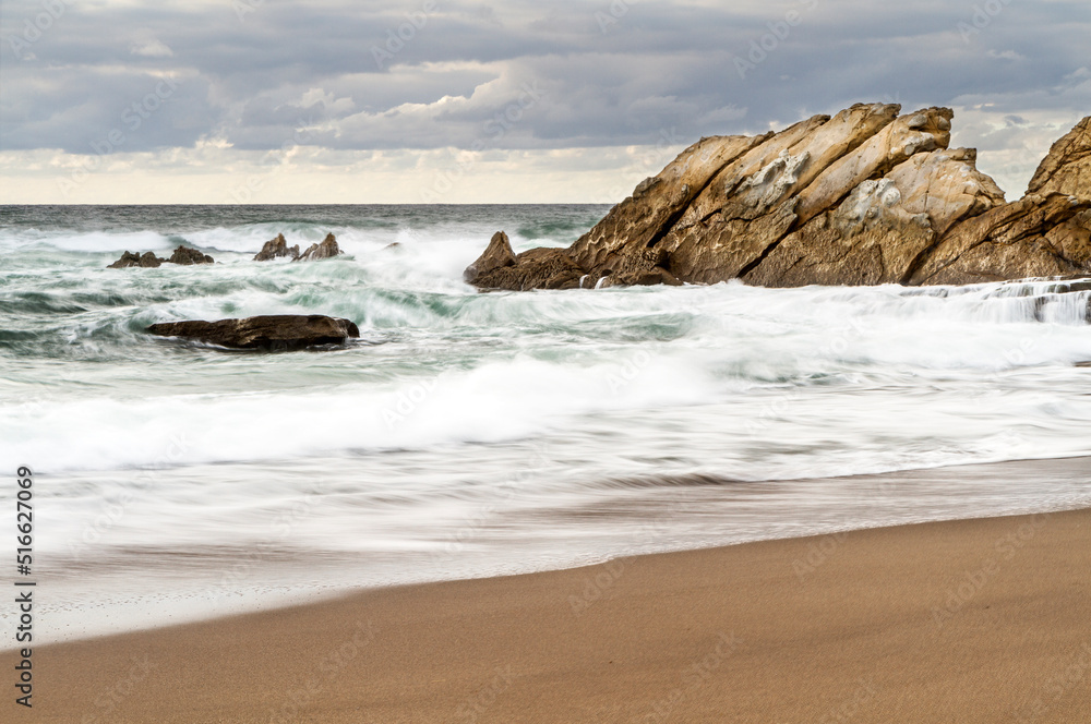 Sunset at Azkorri beach in the coast of Biscay, Basque Country, north of Spain. Sunset at Azkorri beach in the coast of Biscay, Basque Country, north of Spain.