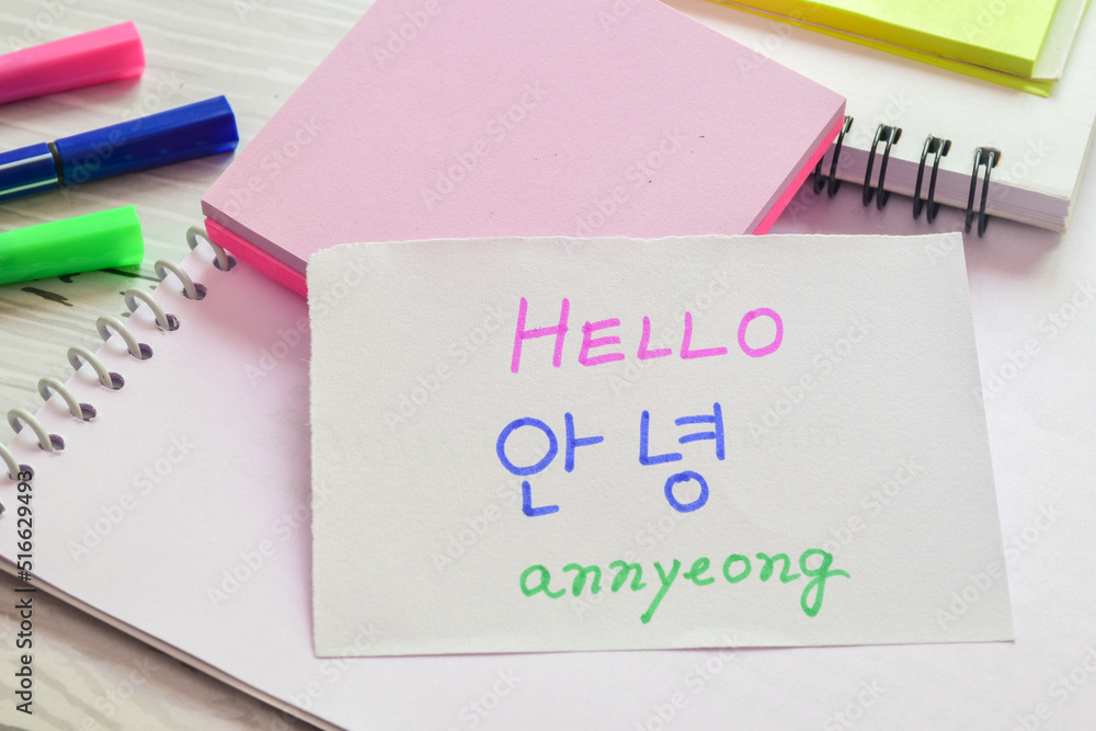 Annyeong; informally saying hello in Korean handwritten in both English