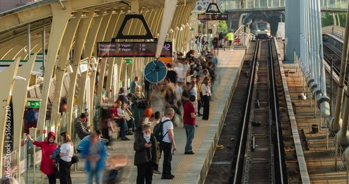 Timelapse motion: Crowd of people waiting for train on railway station Istanbul, Turkey. Golden Horn Metro Bridge, train goes from tunnel