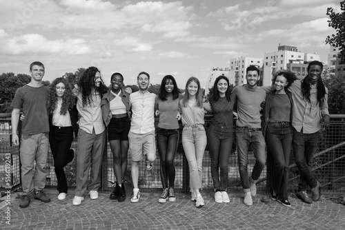 Group of friends of different nationalities together - black and white photo