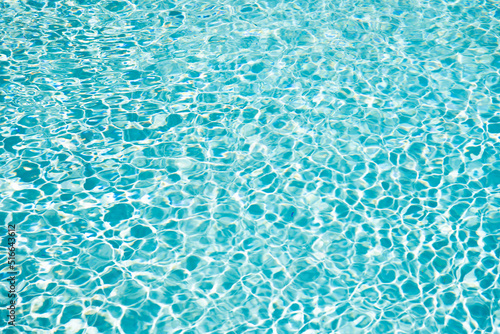 turquoise swimming pool water background with ripples