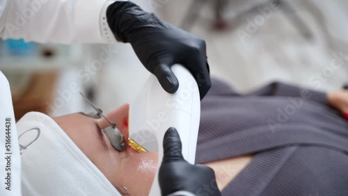 Woman undergoing facial phototherapy with BBL laser