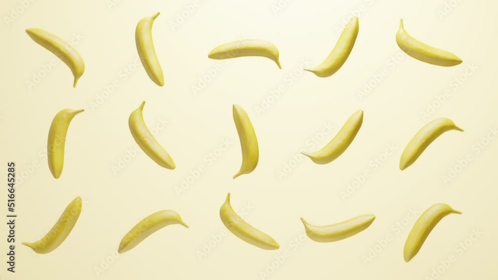 Many bright bananas rotate on a light background. Many bright bananas rotate on a light background.