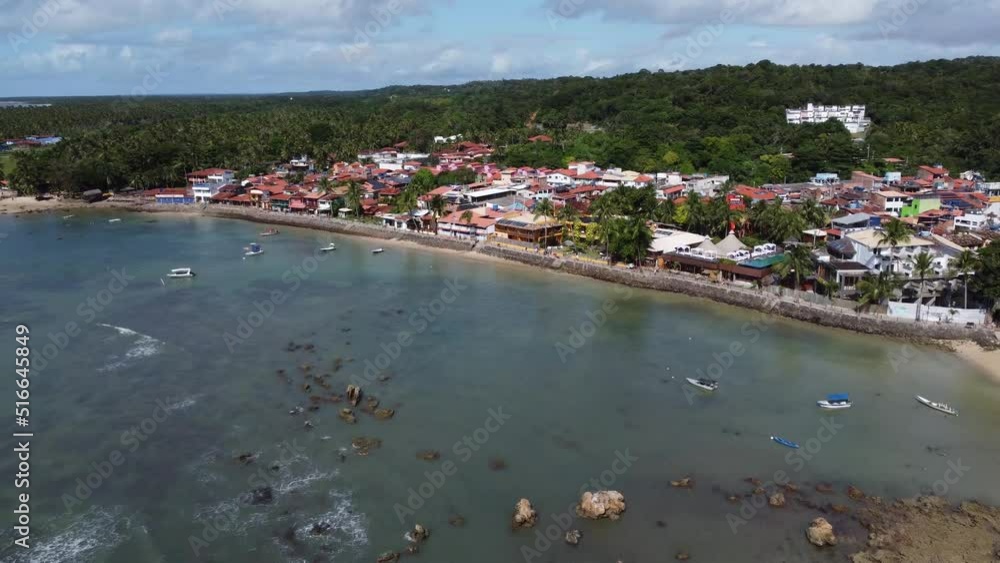 Beautiful and quiet beach in Gamboa in Bahia with natural cliffs