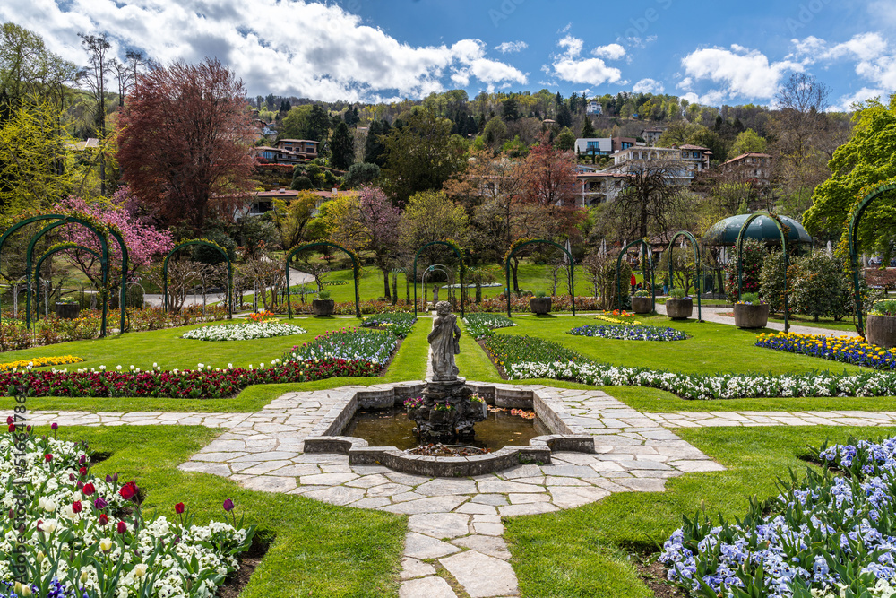The  garden of Villa Pallavicino full of blooming tulips in springtime, Stresa Piedmont, Italy.