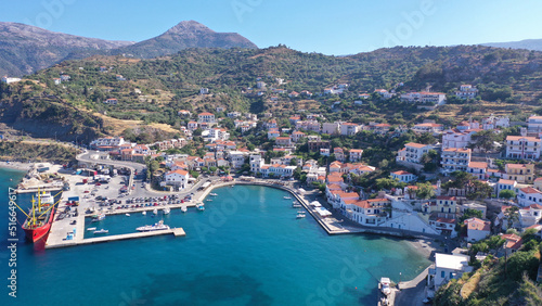 Aerial drone photo of famous small picturesque port of Evdilos in island of Ikaria, Northeast aegean, Greece