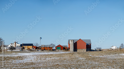 Amish farm on a snowy field in Holmes County, Ohio © Isaac