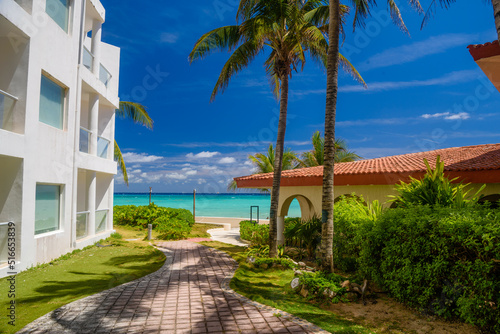 Luxury white villa with palms in Playa del Carmen, Yukatan, Mexico © Eagle2308