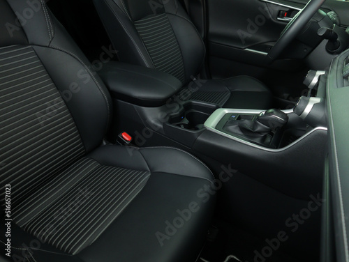 Car interior. Salon of a new modern car. Auto seats. © Brylynskyi
