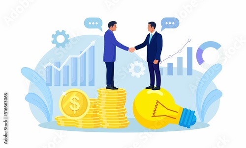 Entrepreneur businessman standing on lightbulb shaking hands with VC on money coins stack. Successful business negotiation, partnership. Selling startup business or merger agreement