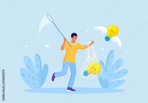 Businessman chasing and catch flying light bulb with butterfly net. Capture new business ideas, search for innovation or creativity, brainstorm or invent new project. Motivated employee seek solution