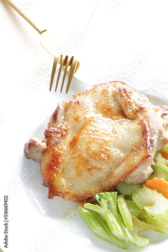 Homemade grilled chicken tight meat served with celery and carrot