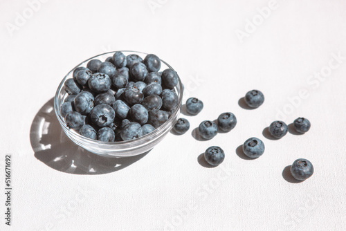 Blue blueberry on white table  card with organic sweet food