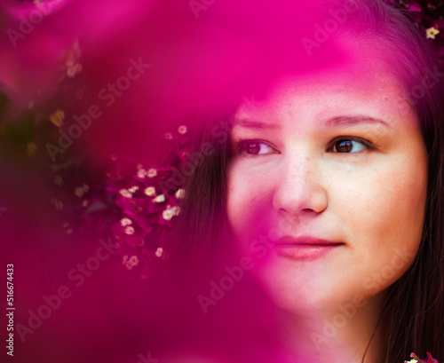 young pretty brunette girl surrounded by purple flowers  lifstyle people touristic season