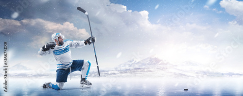 Photography Professional hockey player in a helmet and gloves and a stick in his hands