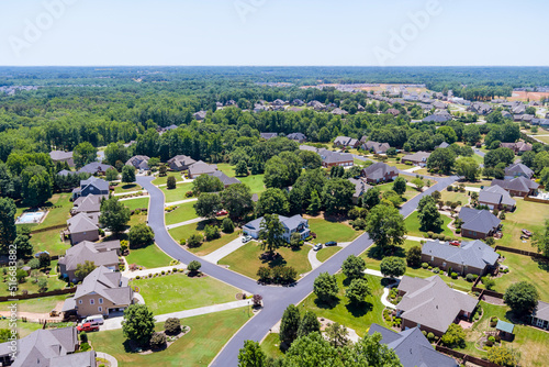 Fototapeta Naklejka Na Ścianę i Meble -  Top view of sleeping area in street a small town of from above aerial view in Boiling Springs South Carolina US