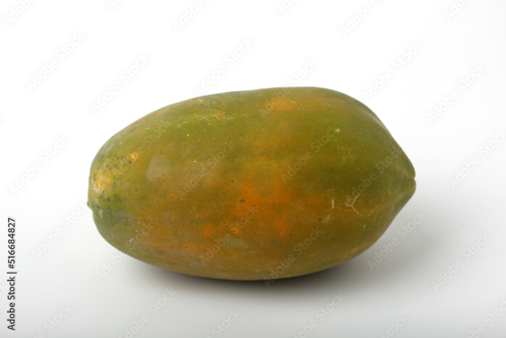 Almost ripe papaya isolated on white background Almost ripe papaya isolated on white background