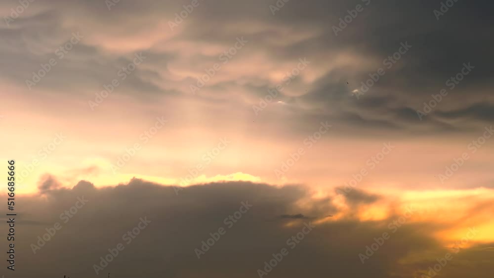 Dramatic Cloudy Sky At Sunset. close up, timelapse Dramatic Cloudy Sky At Sunset. close up, timelapse