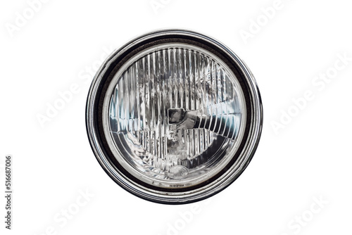 Old round headlight, an old-timer vehicle detail isolated on white