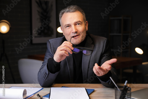 Mature businessman video ch...