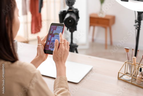 Female Asian blogger with p...