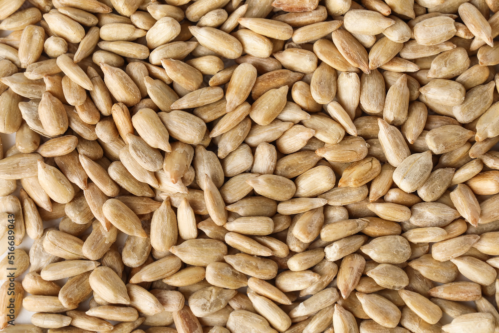 Closeup view of peeled sunflower seeds as background Closeup view of peeled sunflower seeds as background