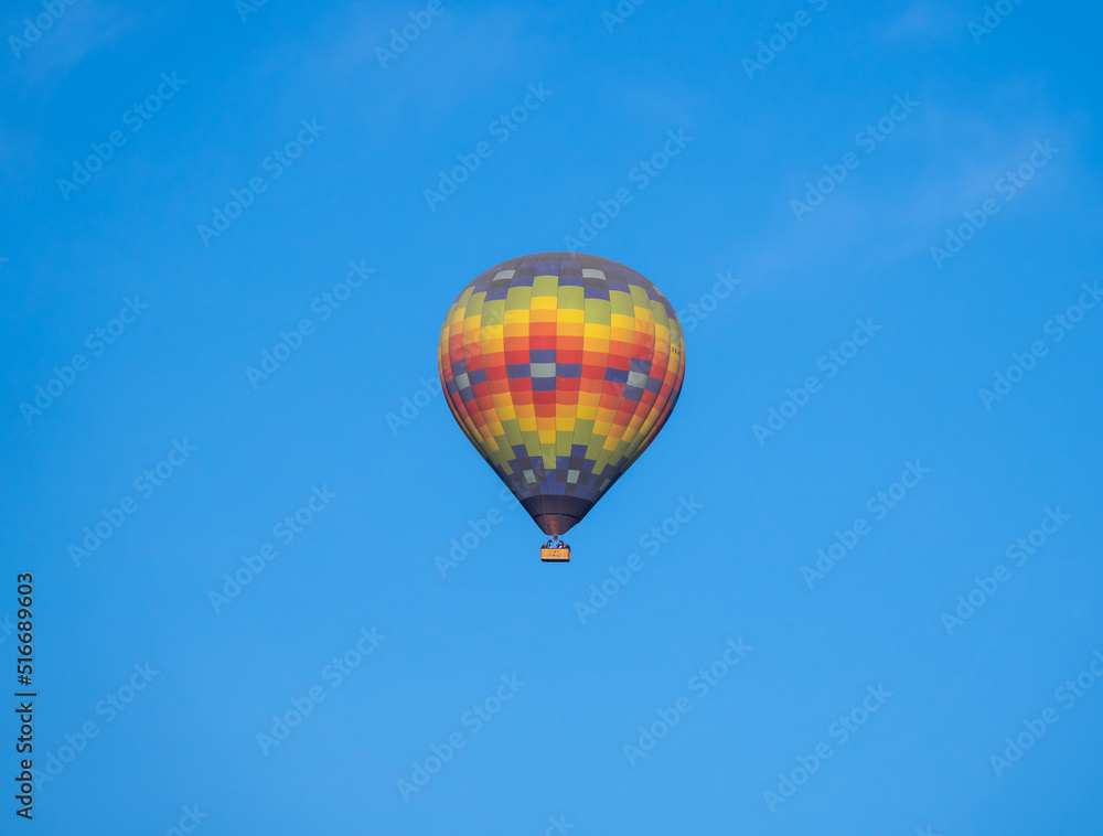 Naklejka premium Isolated Colorful Hot Air Balloon Flying Over Ancient Pyramid of Teotihuacan, Mexico