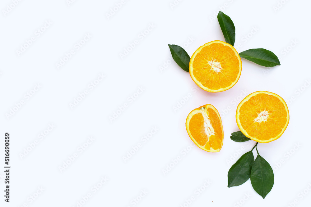 Orange fruit with green leaves on white background. Orange fruit with green leaves on white background.