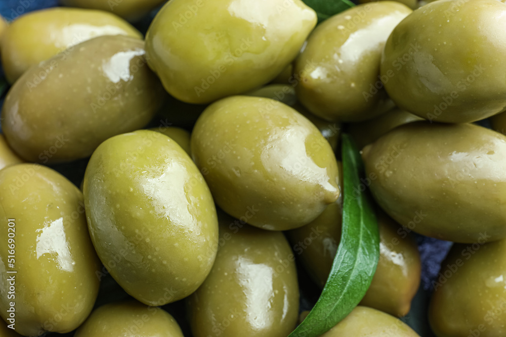 Tasty green olives as background, closeup Tasty green olives as background, closeup