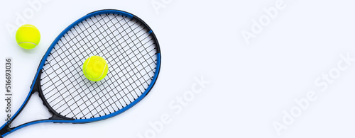 Tennis racket with balls on white. © Bowonpat