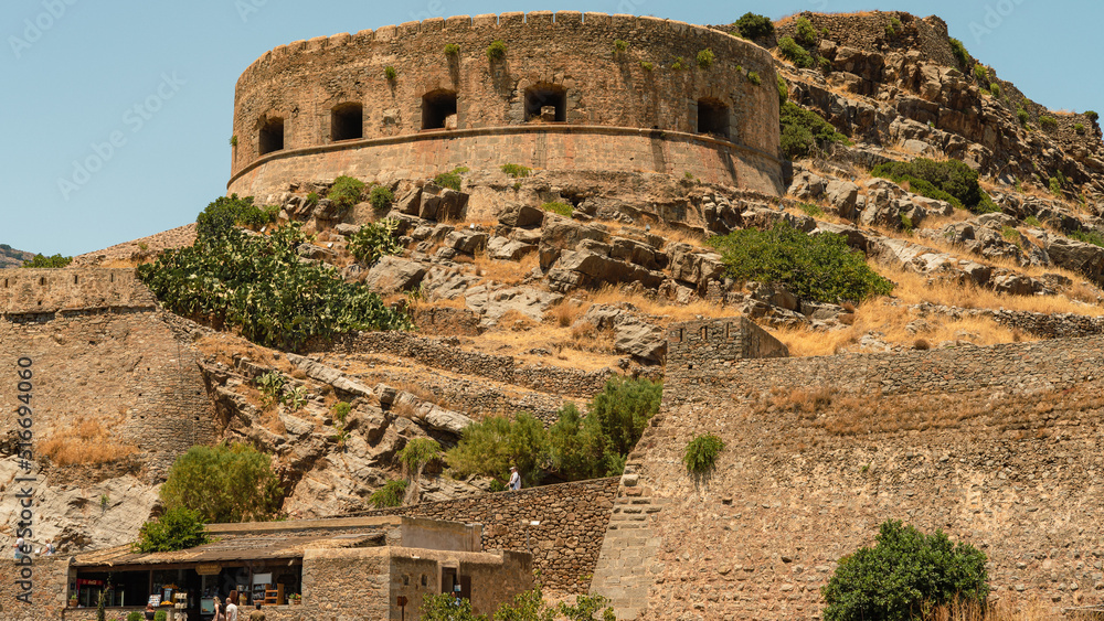 The island of lepers (Spinalonga) is an island in southern Greece and the second most visited tourist attraction in Crete .