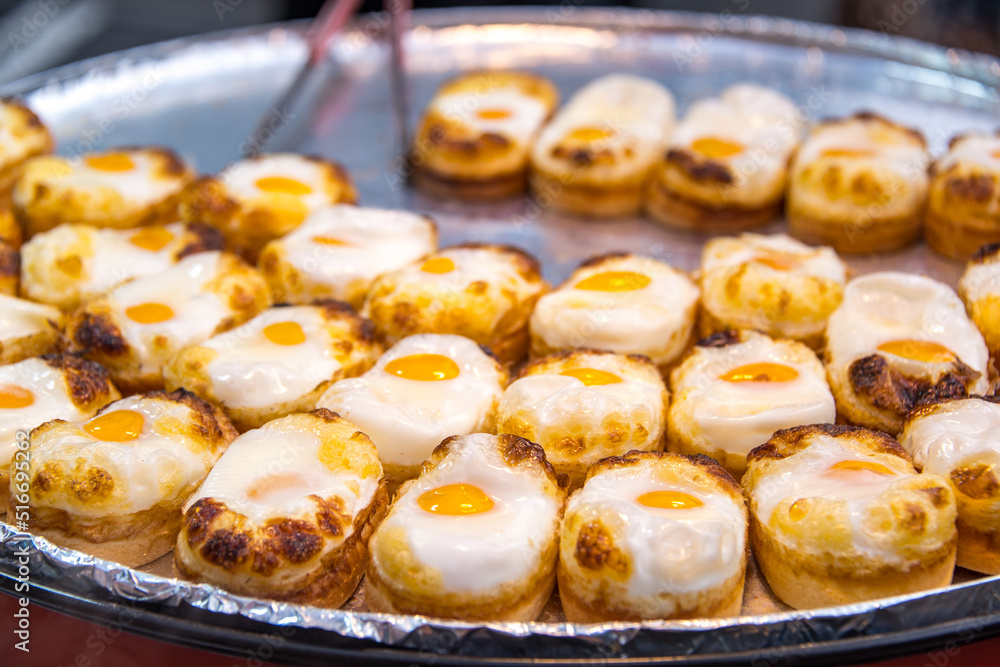 Egg buns are selling in the Myeongdong night market, Seoul, South Korea. Egg buns are selling in the Myeongdong night market, Seoul, South Korea.