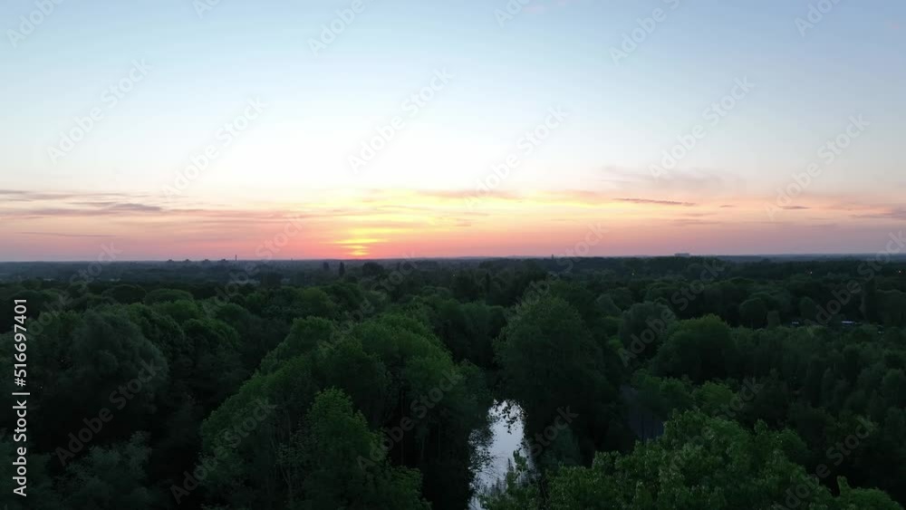 dropping down from a sunset to a Dutch canal dropping down from a sunset to a Dutch canal