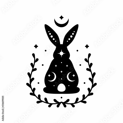 Celestial animal silhouette of sitting back rabbit. Magic bunny with natural elements. Black magical bunny rabbit, mystic crescent moon esoteric symbol, constellation elements. Vector rabbit for decor