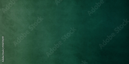 Green blackboard Soft green backdrop background with grunge texture, watercolor painted mottled green background. Green abstract grunge texture panoramic background.	

