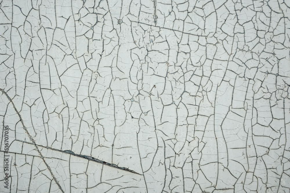 Background of white cracked old paint