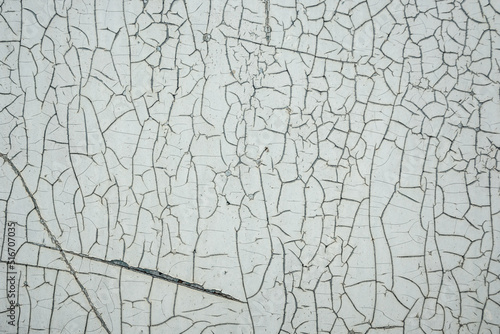 Background of white cracked old paint