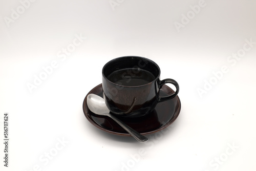 Black coffee in a black glass set,Include Clipping Path.