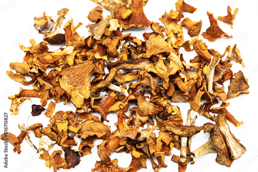 Dried chanterelles, dehydrated mushrooms on white. Dried chanterelles, dehydrated mushrooms on white.