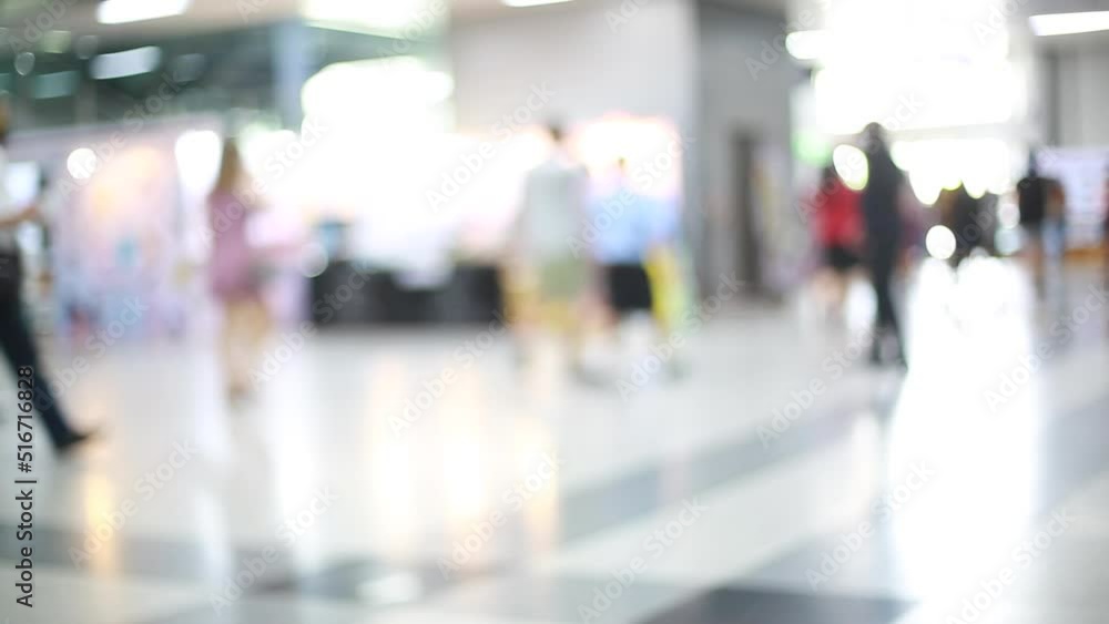 Blurry video of Many people walking in exhibition events or fairs with slow motion speed. Blurry video of Many people walking in exhibition events or fairs with slow motion speed.