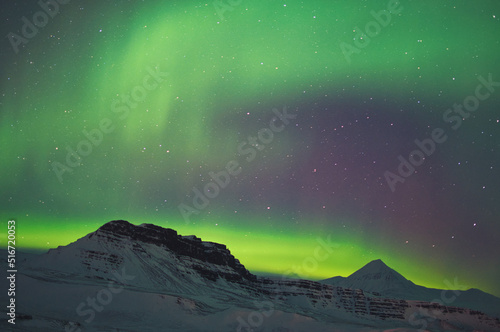 Aurora over the extinct Grabrok volcano, Iceland